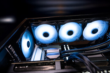 The inside of a modern computer assembled in 2025, showing DDR5 memory and other components.