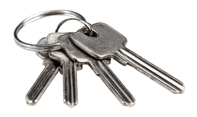Close-up of three metal keys attached to a key ring