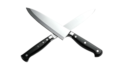 Two crossed chef's knives with shiny blades, black handles, and a dark background