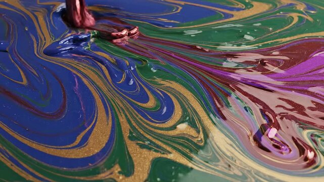 Viscous liquid marble substance flowing and blending along abstract winding unpredictable paths creating swirling fields of vibrant color conceptual background, unpredictable paths, abstract