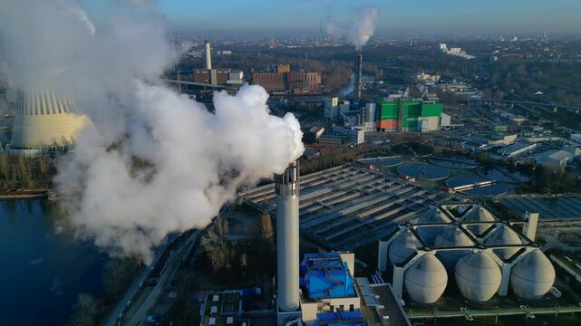 sewage treatment plant Industrial emitting smoke. Majestic aerial view drone