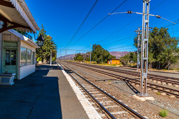A view down the platform at the train station in the Victorian  town of Matjiesfontein in the Western Cape  in South Africa in springtime