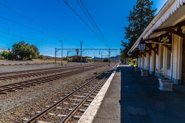 A view up the platform at the train station in the Victorian  town of Matjiesfontein in the Western Cape  in South Africa in springtime