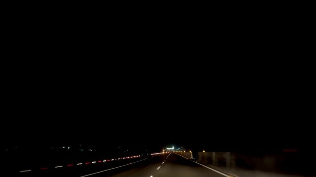 Calm Night Drive Landscape View With Road Lights And Traffic