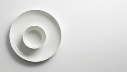 White ceramic dishware arranged for dining, suitable for background in culinary layout or menu design