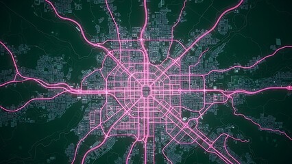 A vibrant pink city map at night showcases transportation routes and infrastructure against a dark background with scattered lights.