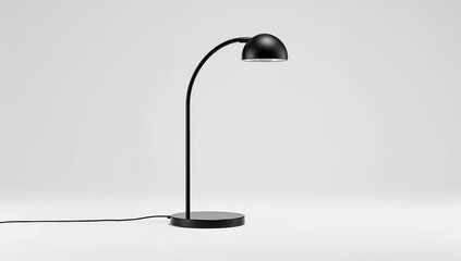 Overhead view of a black reading table lamp set against a white background, designed for focused illumination, International Day of Light