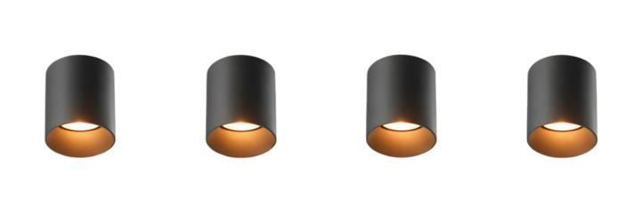 A series of four identical dark cylindrical forms with a warm glowing orange light emanating from their bases against a black background
