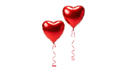 A vibrant red heart shaped balloon floats with a romantic ribbon as a symbol of love and celebration for a Valentine's Day party or wedding decoration