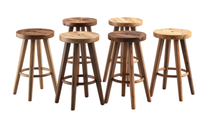Several wooden stools of varying shades on a black background, slightly angled and grouped