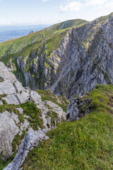 Fototapeta premium Steep Limestone Cliffs and Mountain Panorama
