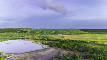 Fototapeta premium A lake forms during the rainy season near the villagers' settlement