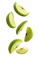 Green apple slices, in mid-air, with a slightly elevated perspective