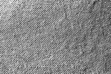 Detailed close-up of twill fabric showing diagonal weave pattern.