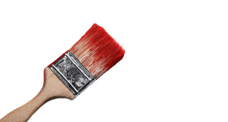 Close-up of a paintbrush with red paint.  Wooden handle, metal ferrule, bristles coated in vibrant crimson.  Against a black background