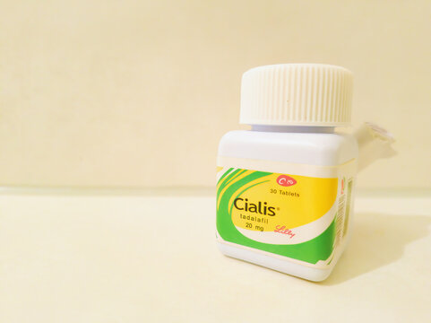 Ditzingen, Germany - December 20, 2025: Downtown  This is a small bottle with 30 tablets of Cialis, a sex anhancer for men.