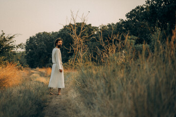 Jesus Walking Barefoot on a Dirt Road &ndash; Spiritual Journey and Humility