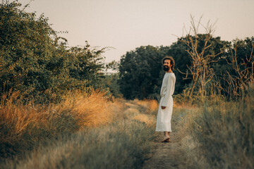 Jesus Walking Barefoot on a Dirt Road &ndash; Spiritual Journey and Humility