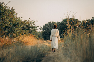 Jesus Walking Barefoot on a Dirt Road &ndash; Spiritual Journey and Humility