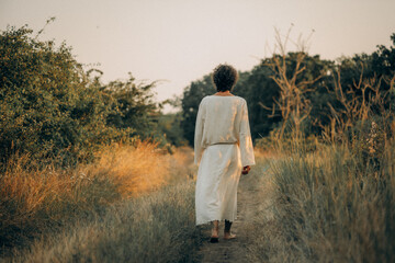 Jesus Walking Barefoot on a Dirt Road – Spiritual Journey and Humility