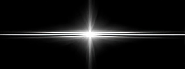 Bright white cross shape on black background with light flares