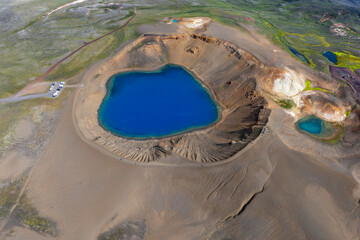 drone view of the turquoise Viti Crater Lake in the Kravla volcanic caldera in northern Iceland © makasana photo
