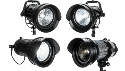 Four black stage spotlights, front-facing, lit with bright, diffused light