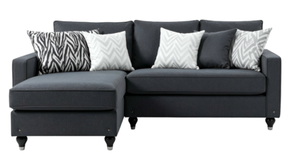 A modern dark gray sectional sofa with accent pillows