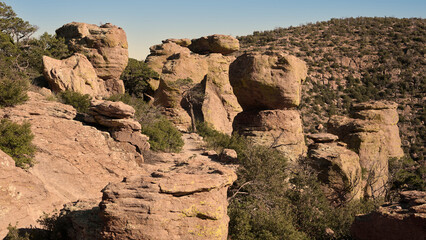 Balanced rock boulders on dry desert hillside © jia
