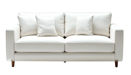 A modern, white, two-cushion couch with two back pillows and two smaller lumbar cushions