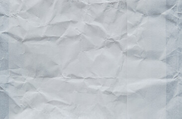 Obraz premium A sheet of white wrinkled thick paper as background