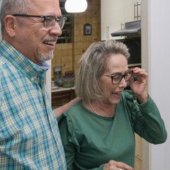 Senior couple having good time together at home. Hapiness.