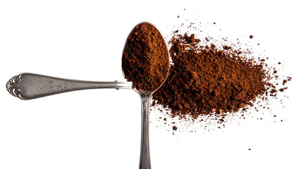 Spoonful of brown powder next to a small pile against a black backdrop
