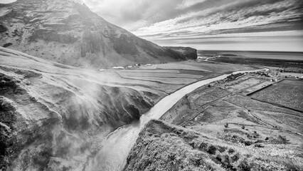 Summer adventure on Skogafoss trail with stunning Icelandic waterfalls