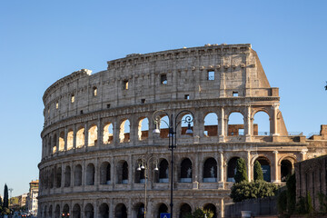 Fototapeta premium Many tourists visit the Colosseum, also known as the Flavian Amphitheater from the time of the Roman Empire, built in the 1st century, located in Rome, Italy.