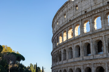 Fototapeta premium Many tourists visit the Colosseum, also known as the Flavian Amphitheater from the time of the Roman Empire, built in the 1st century, located in Rome, Italy.