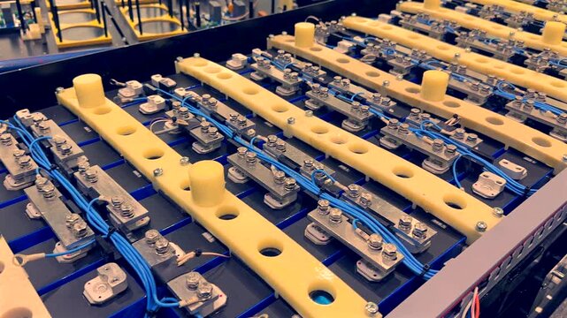 Electric vehicle battery for truck and , Lithium Iron Phosphate Batterys, EV technologies. Manufacturing of EV Lithium Battery pack. Lithium car battery on Production Line, Conveyor. Electric Car.