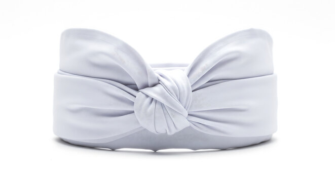 Traditional Balinese udeng headpiece isolated on white, symbolizing spiritual harmony, cultural identity, and sacred ceremonial lifestyle in Bali.