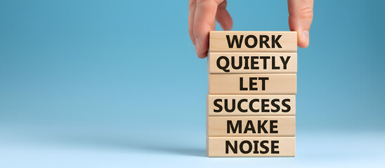 A stack of wooden blocks spelling out a motivational message on a serene blue background, illustration of a word concept in a square shape arrangement