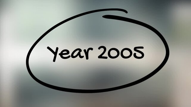Year 2005 Handwriting with Black Marker on Glass Surface