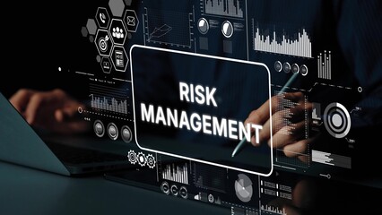 Business Professional Analyzing Data for Effective Risk Management Strategy Using Advanced Technology in Modern Office Environment. Asymptotic smart data analytic.