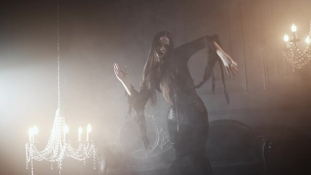vGothic femme fatale portrait featuring a woman in black godet dress with corseted waist, long straight hair, and dramatic makeup in opulent dimly lit gothic surroundings.