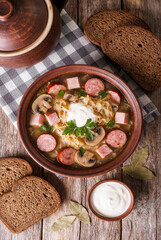 Traditional Sauerkraut Soup with Sausage and Mushrooms