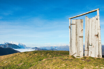 Stunning shot of the entrance way wich leads to a view of breathtaking beauty. Door to Nowhere. Costa del Palio, Lombardy, Italy