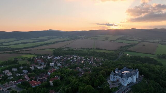 Aerial view of Halic Castle in the village of Halic in Slovakia - Sunset