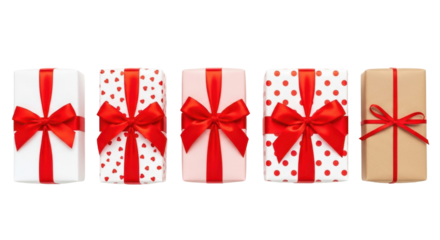Five assorted gift boxes with red ribbons and bows, isolated on black