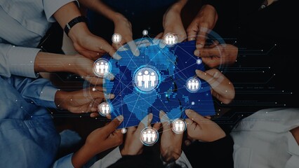 Hands from diverse individuals hold a blue digital network map, symbolizing global teamwork and collaboration in a modern business landscape, representing unity and progress. Raster