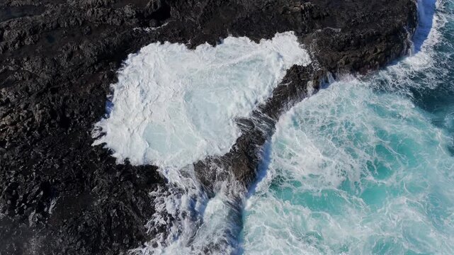 Volcanic Hydro-Explosion: 4K View of the Atlantic Ocean Surging Through the Basaltic Blowholes of El Bufadero de la Garita, Gran Canaria, Canary Islands, Spain