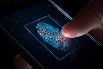 A person is touching a phone screen that has a fingerprint on it