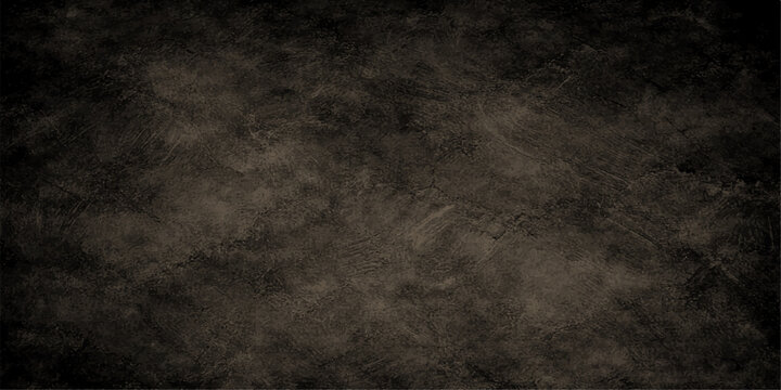 A dark grunge background featuring a vintage aged paper texture over a rough black concrete wall surface for a dirty industrial backdrop design